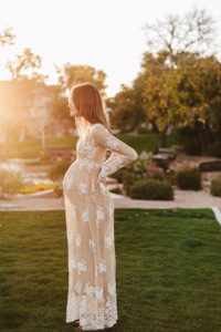 pregnant woman in lace boho maternity dress
