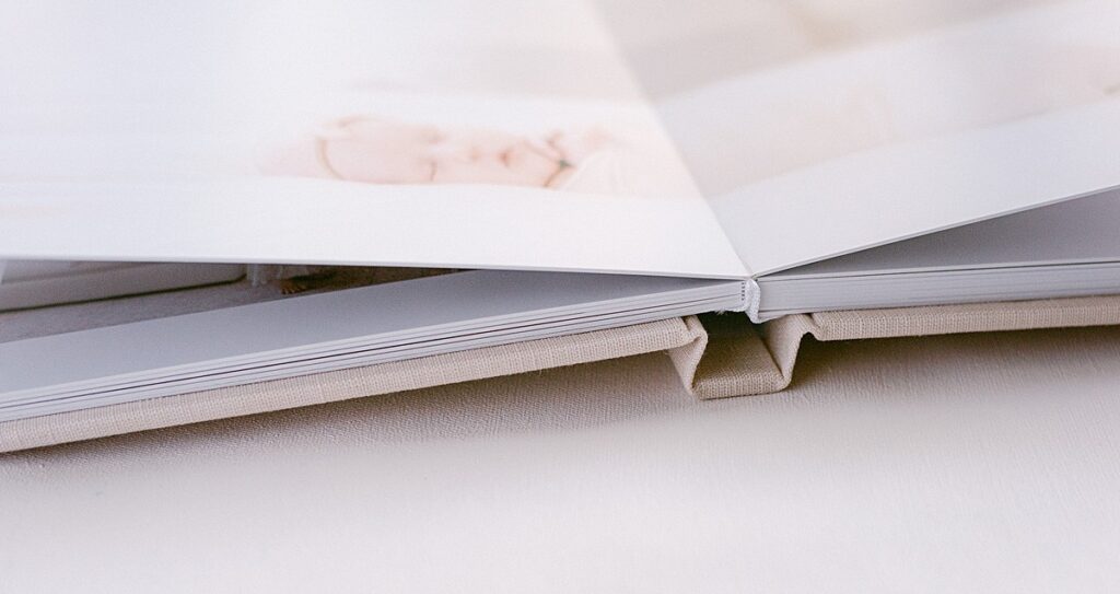 closeup of album binding of newborn album designed by scottsdale az photographer