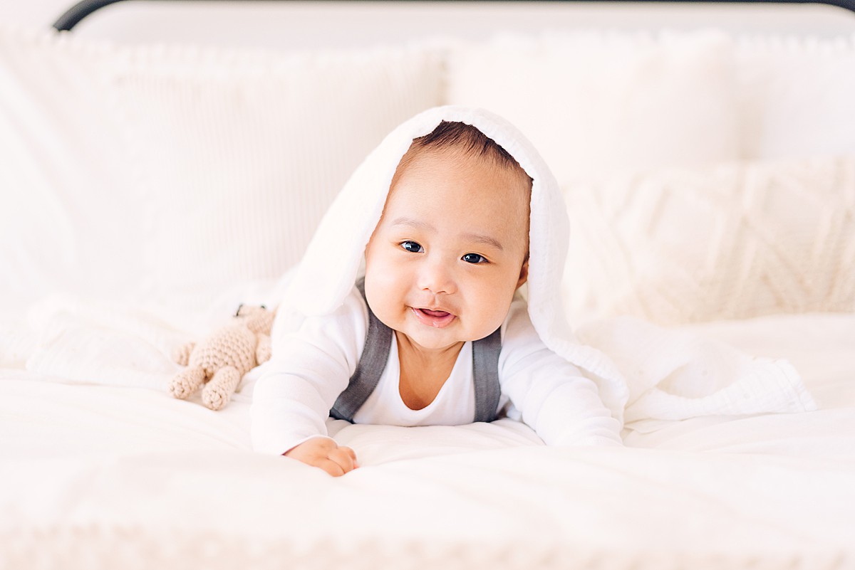 6-month baby photoshoot idea with blanket on head