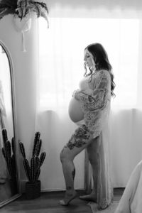 black and white photo of maternity boudoir