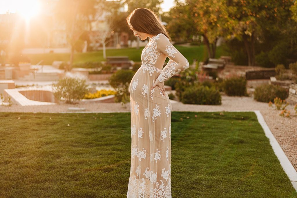 maternity silhouette of baby bump in lace