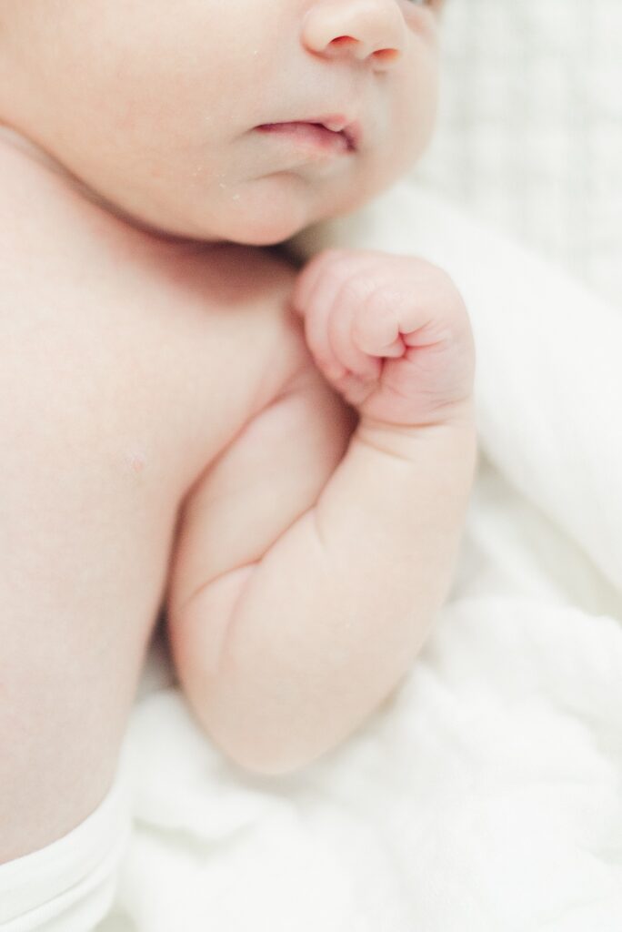 closeup of newborn baby fist